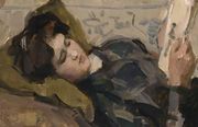 A Reclining Girl Looking At A Print Reproduction